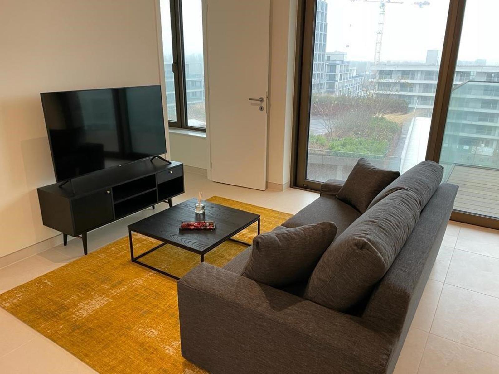 Gemeubeld 1slpk appt. (+bureau) met zicht op de Schelde foto {{pictureIndex}}