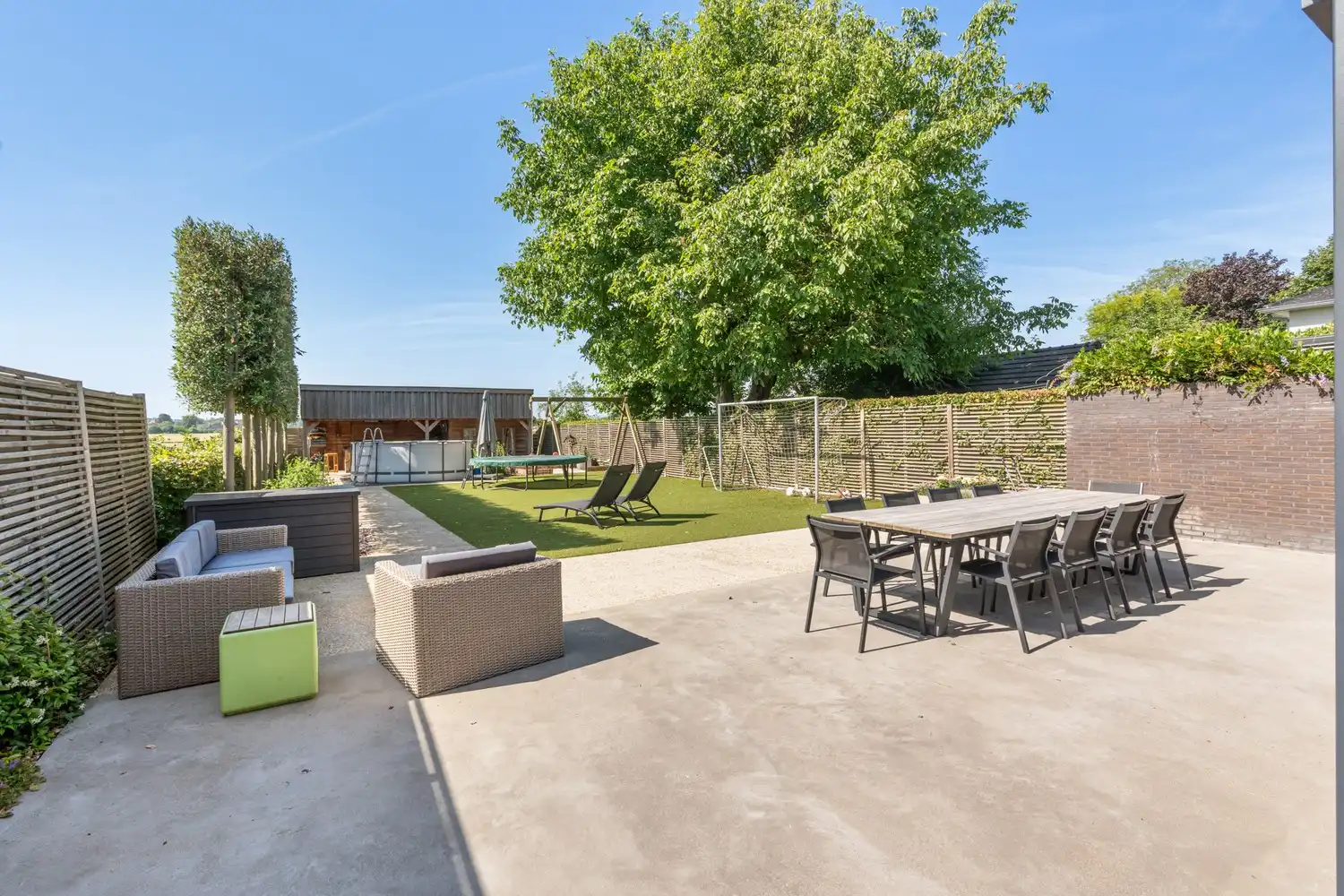Instapklare en energiezuinige halfopen bebouwing met zuidgerichte tuin en vrij uitzicht op het groen! foto 13