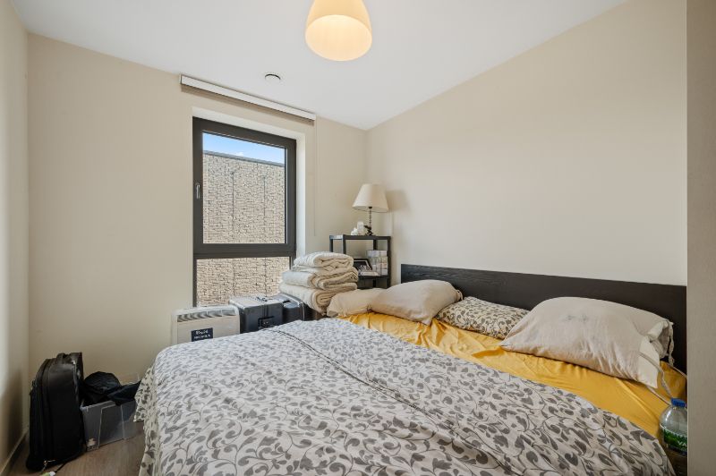 Groot 2-slaapkamer appartement met overdekte staanplaats foto 8