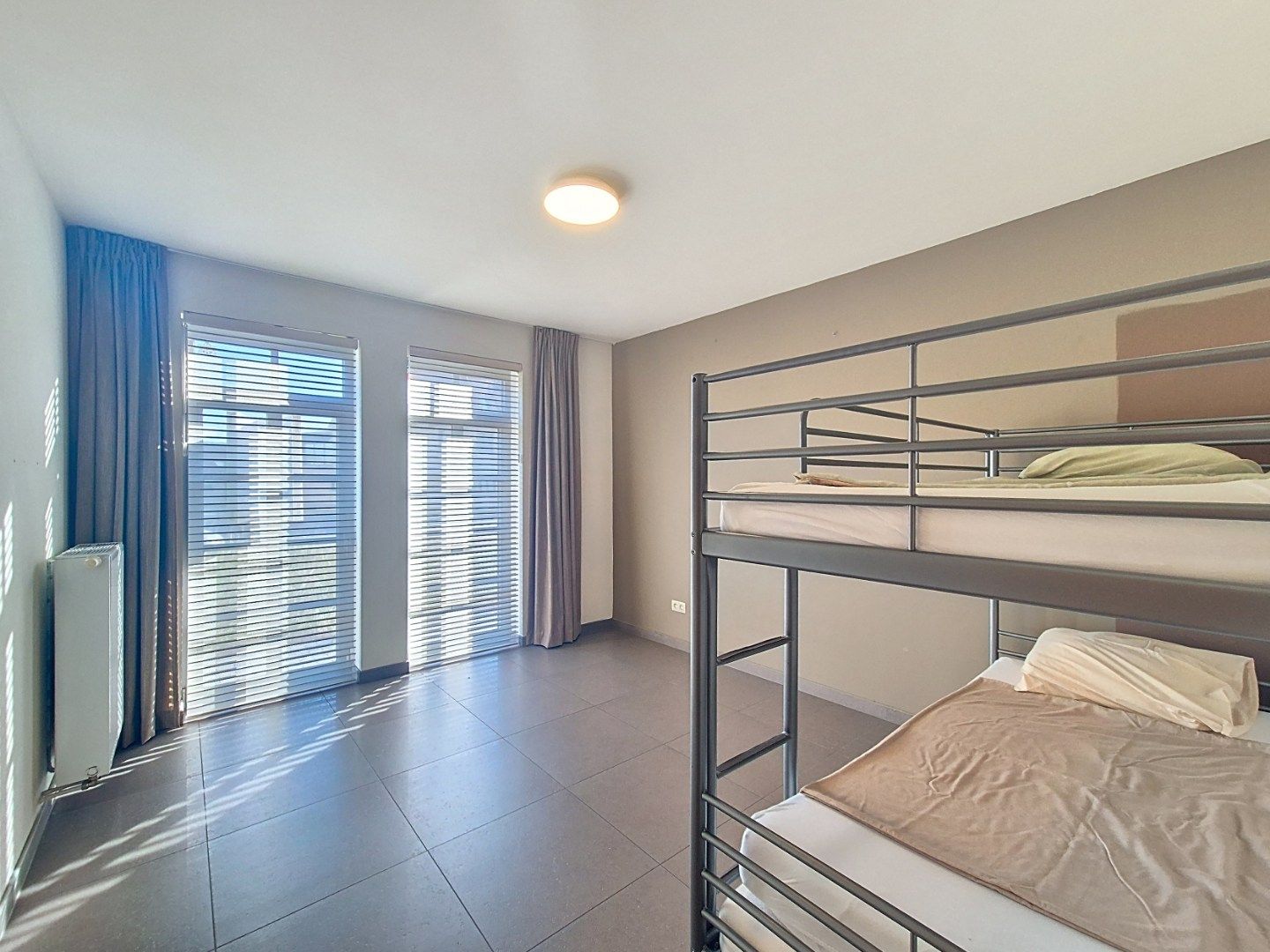 Gelijkvloersappartement met 2 slaapkamers en 2 autostandplaatsen foto 13