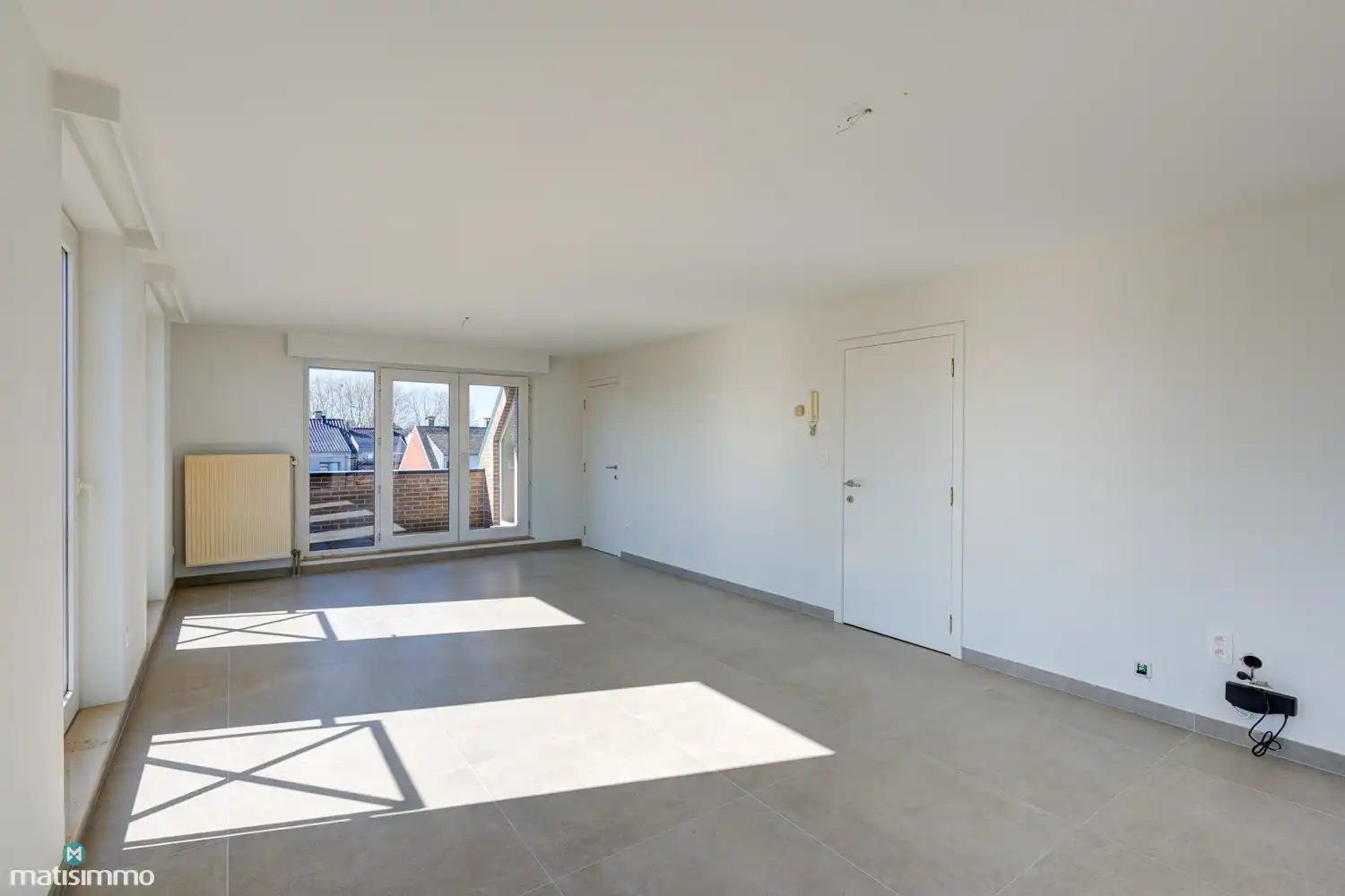 INSTAPKLAAR DUPLEX-APPARTEMENT MET 2 SLAAPKAMERS EN GARAGE NABIJ HET CENTRUM VAN BILZEN foto 2