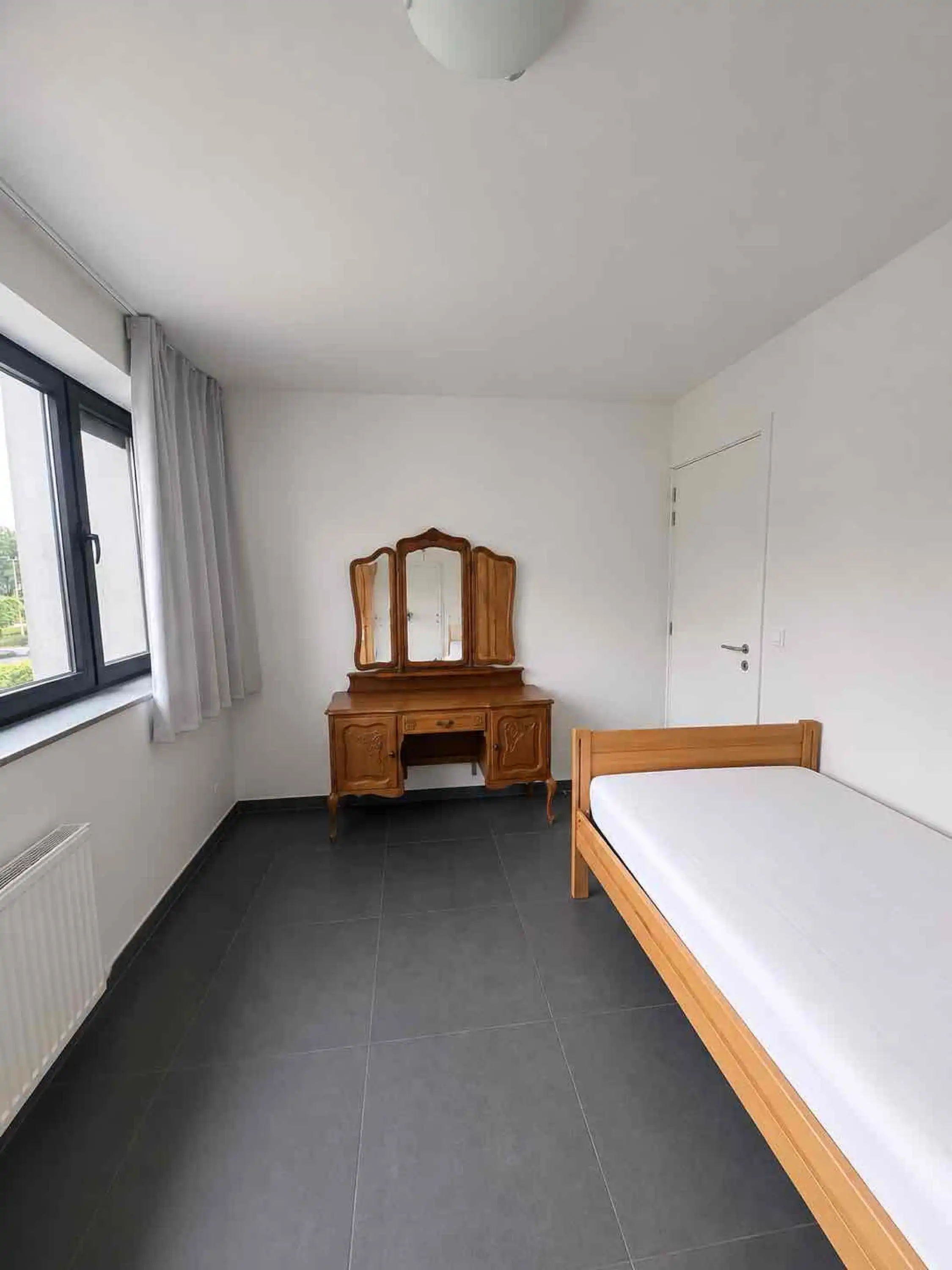 Zeer verzorgd en modern appartement met garagebox te huur foto 9