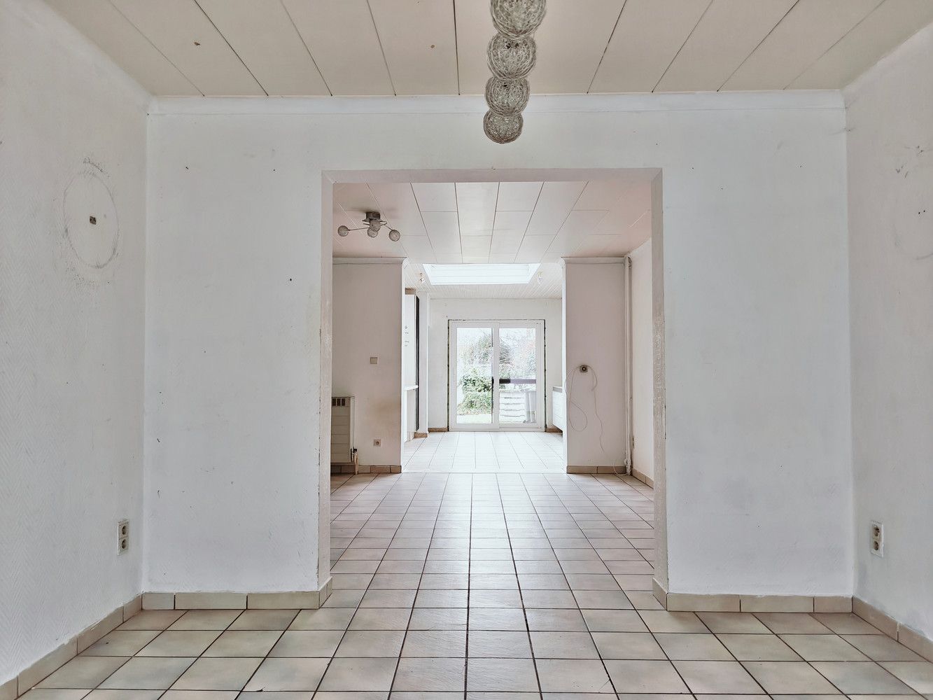 Te renoveren rijwoning met 4 slaapkamers en leuke stadstuin. foto 7