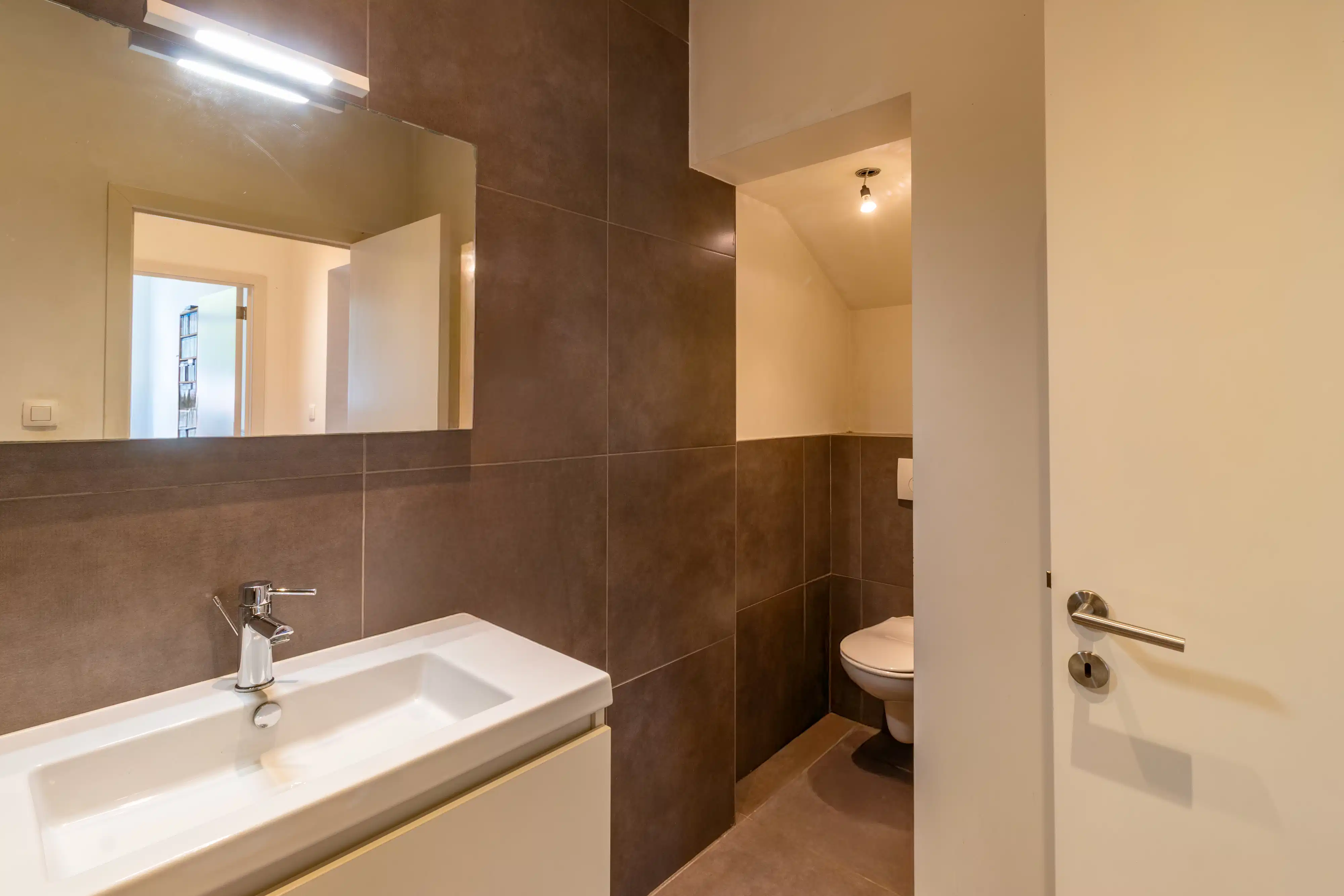 Centraal gelegen gelijkvloersappartement met tuin foto 9