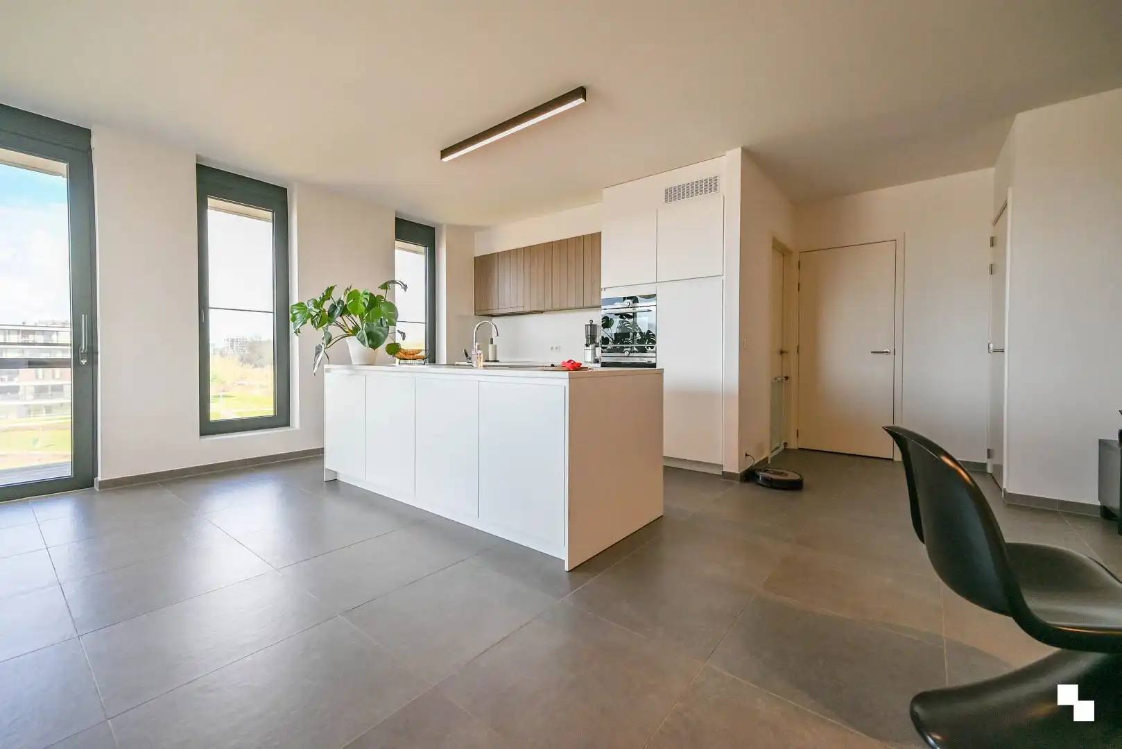 Uniek bijna energieneutraal hoekappartement met ruim terras foto 4
