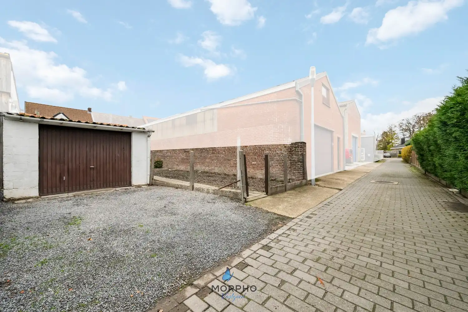 Te renoveren gezinswoning met karakter en potentieel in hartje Ruddervoorde foto 24