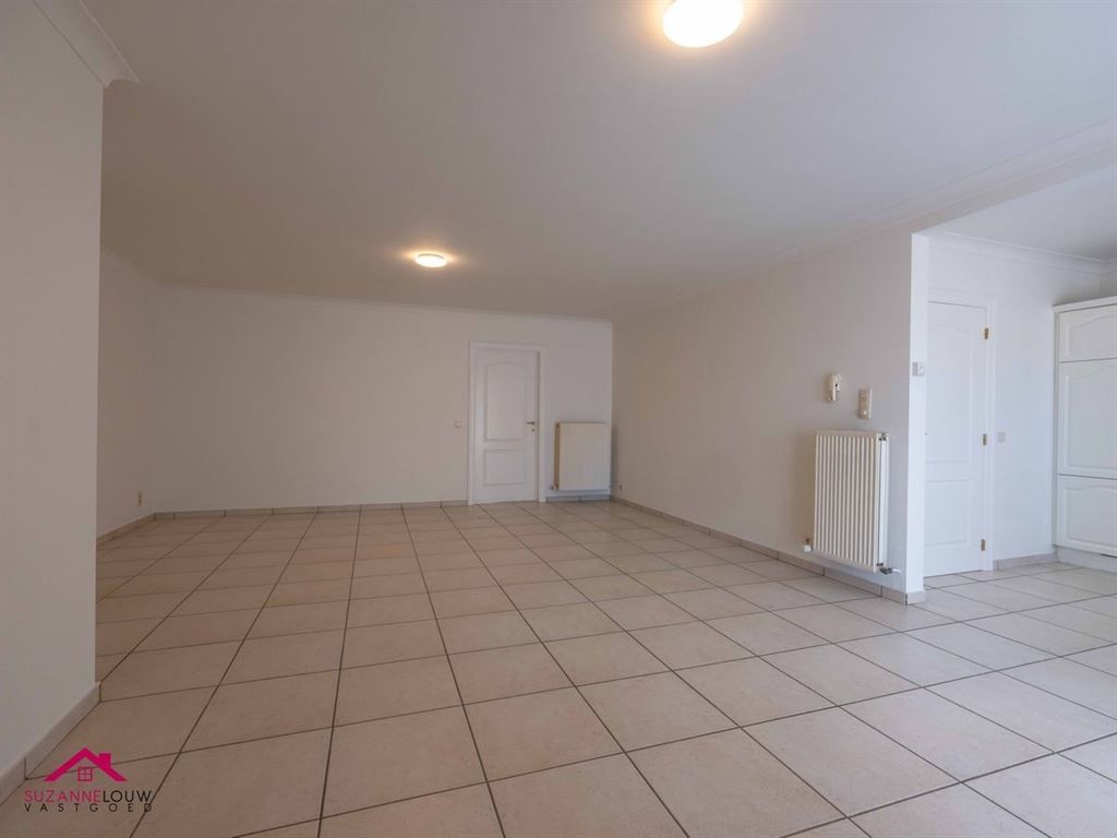 Ruim gelijkvloers appartement met 2 slaapkamers foto 14