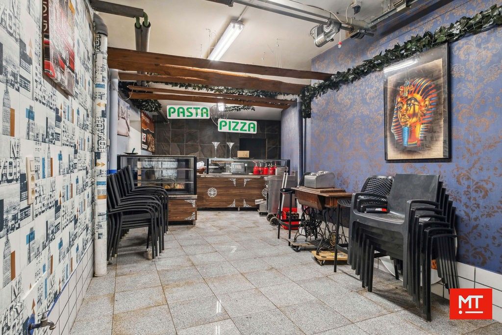 Veelzijdig gebouw bestaande uit handelsruimte, woning en appartement in het centrum van Wervik foto 12