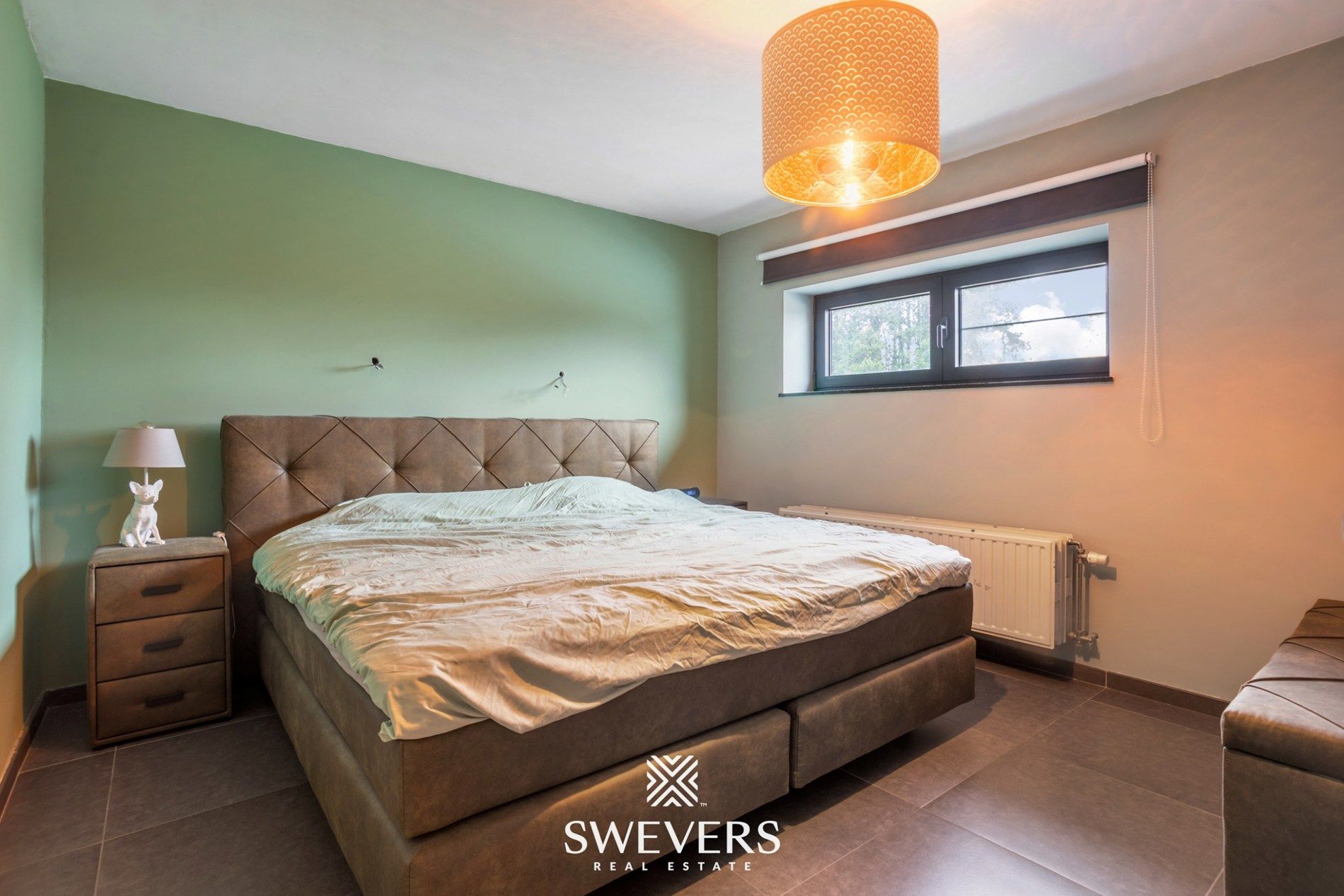 Ruime, instapklare woning met drie slaapkamers en prachtige tuin foto 14