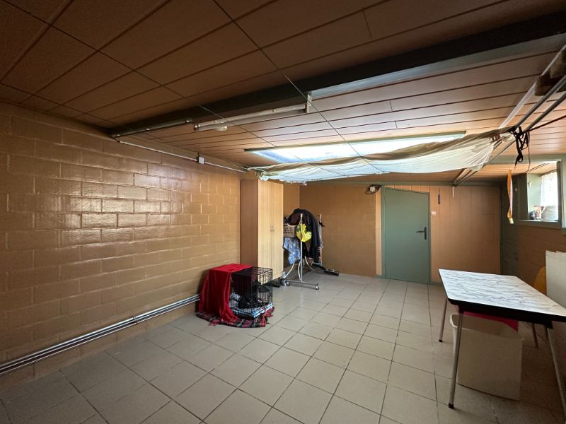 Ruime gezinswoning met grote tuin, veranda en veel opbergruimte foto 14