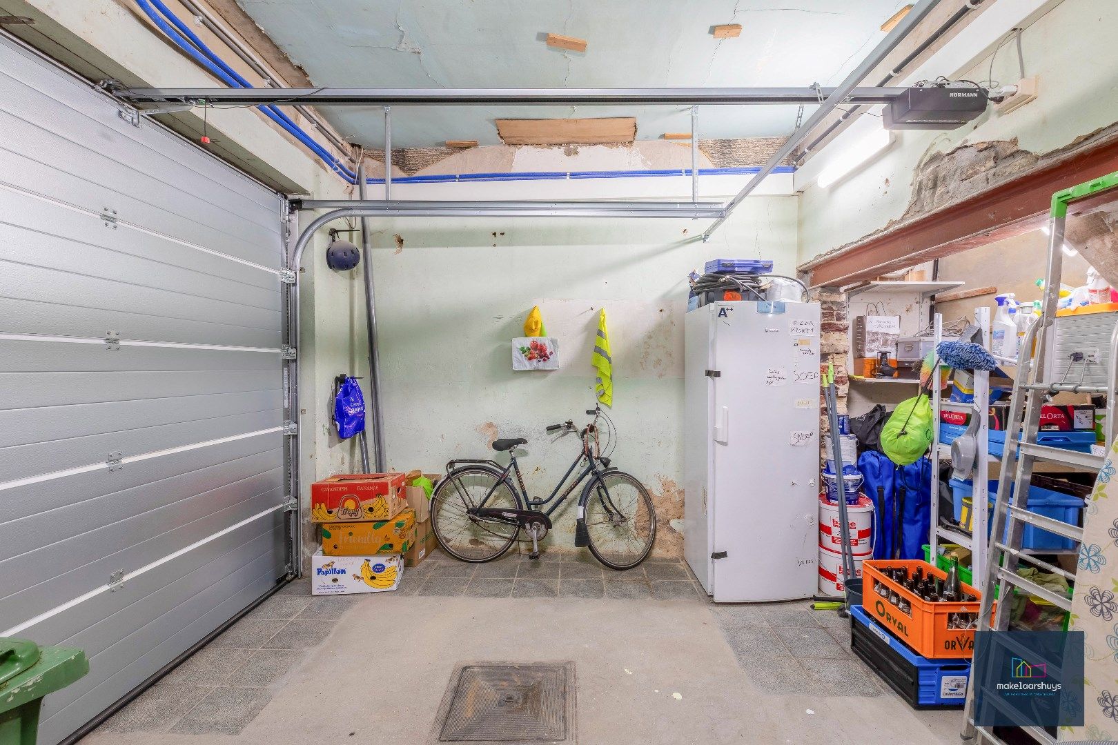 Instapklare woning met aangename tuin en garage foto 24