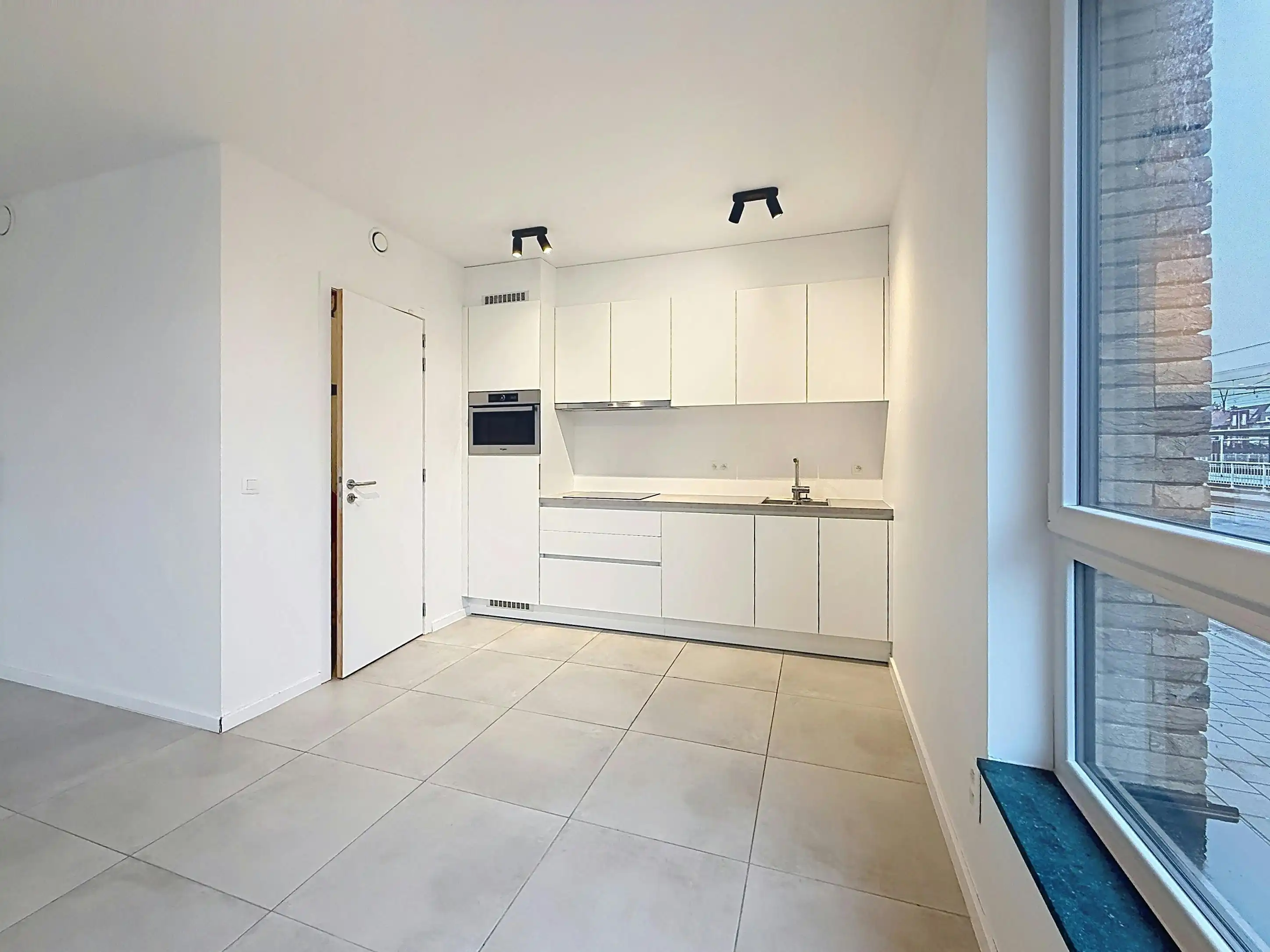 Instapklaar één slaapkamerappartement centrum Aalter foto 9