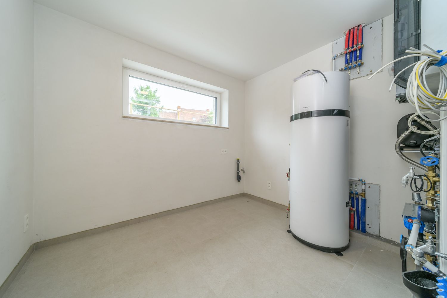 KOKSIJDE: Energiezuinige en kwalitatief afgewerkte nieuwbouwwoning met 3 slaapkamers, carport en gezellig tuintje op 317m² grondopp. foto 12