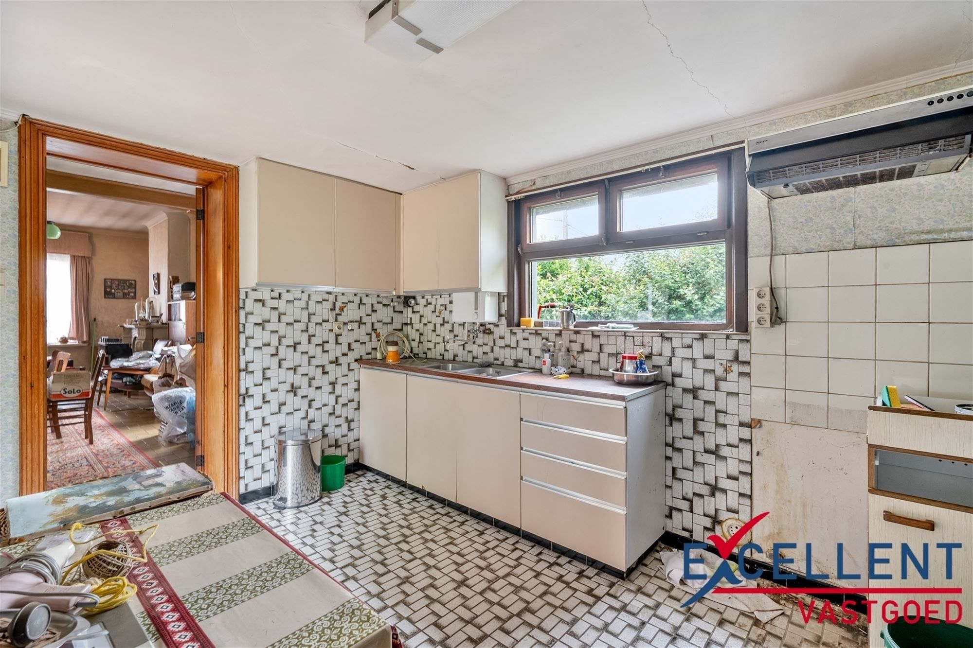 Te renoveren woning met prachtige tuin te koop foto 7