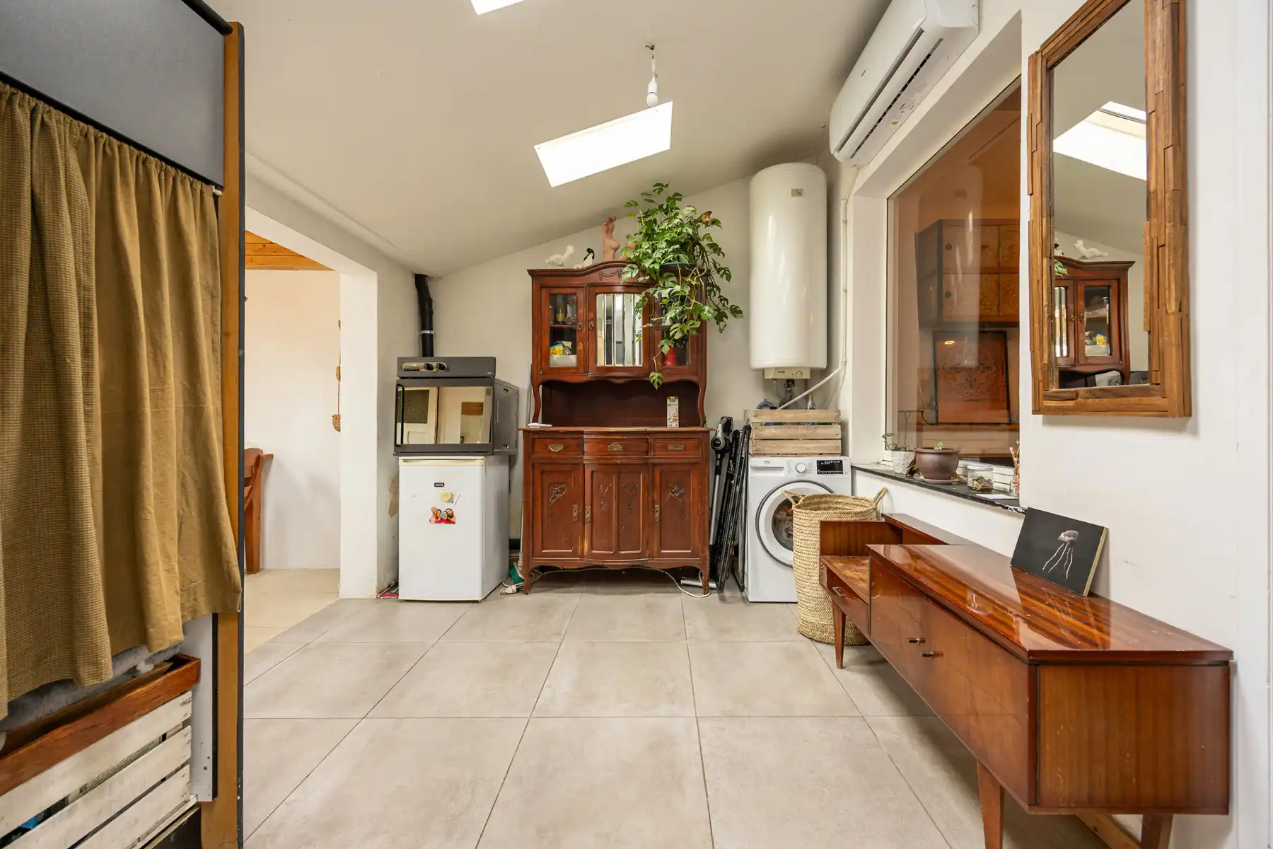 Stadswoning op een perceel van 230 m² met toegang achteraan de tuin. foto 7