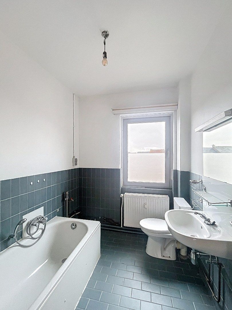 Veelzijdig pand op topligging: wonen en werken of tweewoonst met terrassen en garage foto 18