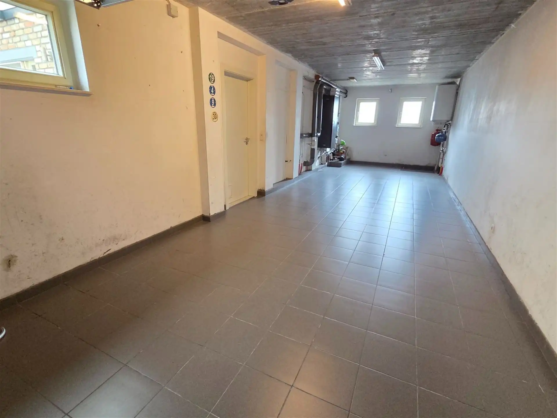 Zeer ruime gezinswoning te centrum Heist, 4 tot 5 slaapkamers met dubbele garage. foto 11