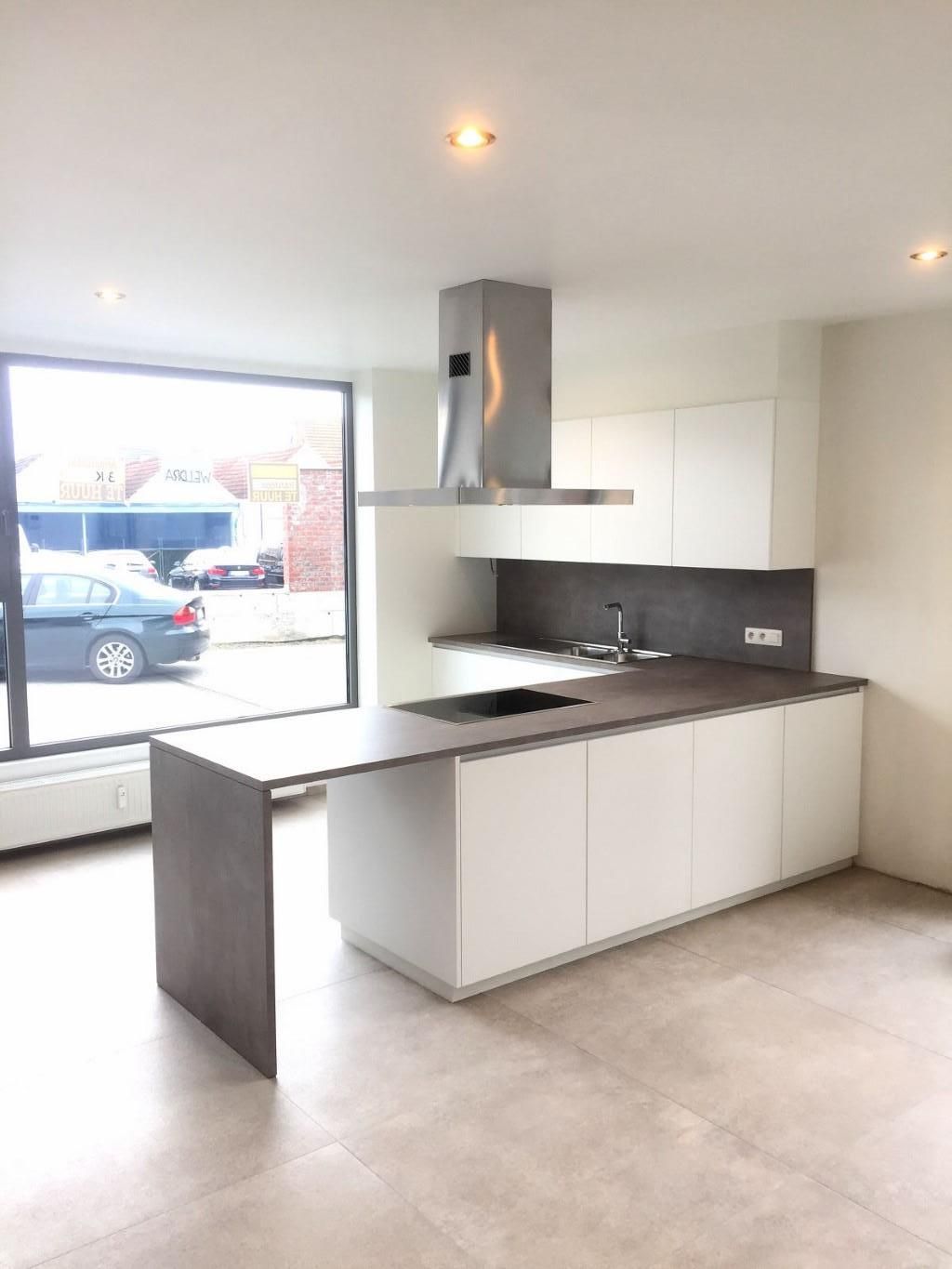 Ruim, verzorgd gelijkvloersappartement met terras en garage foto 7