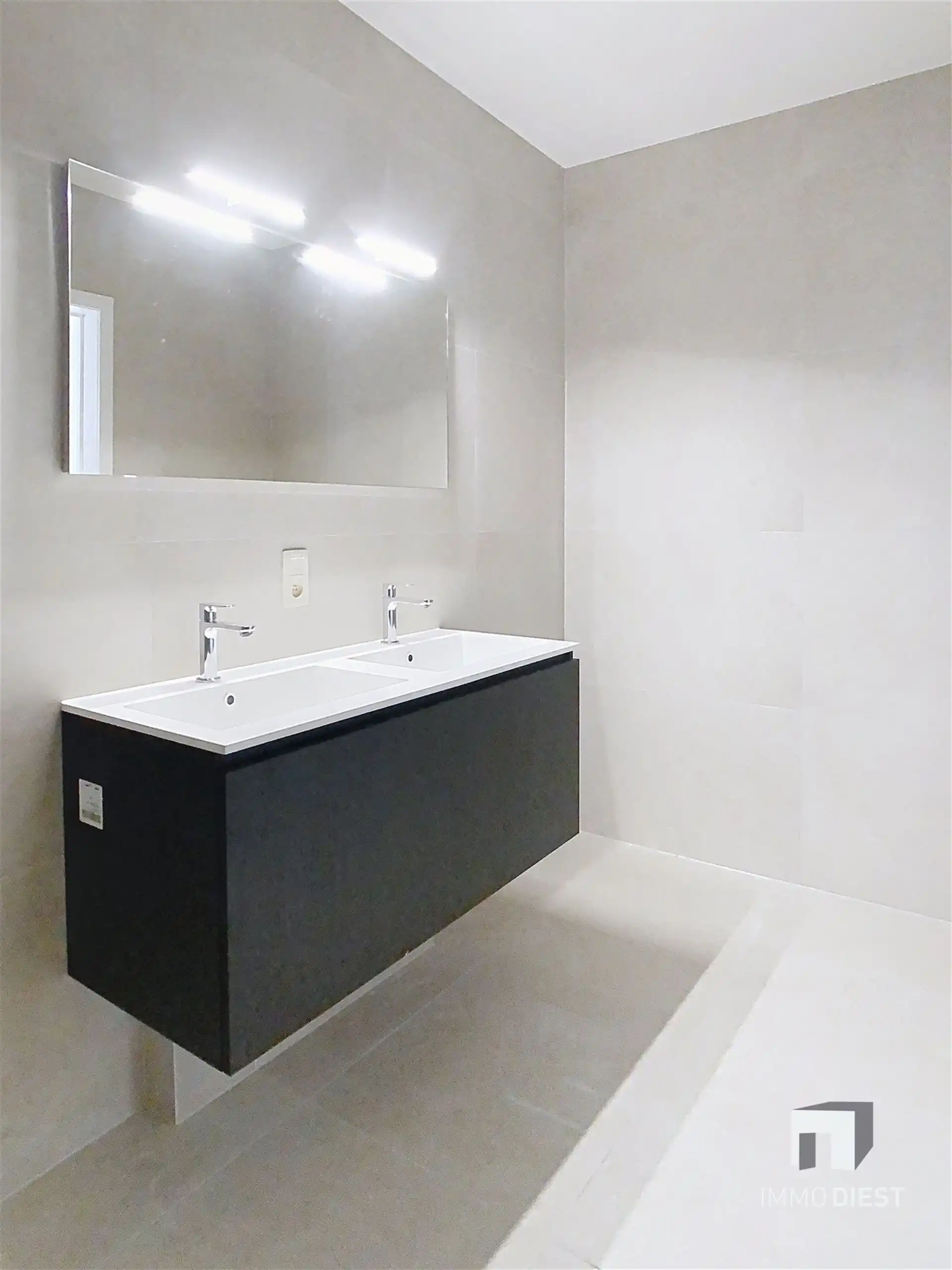 Gelijkvloers appartement met terras en tuintje foto 12