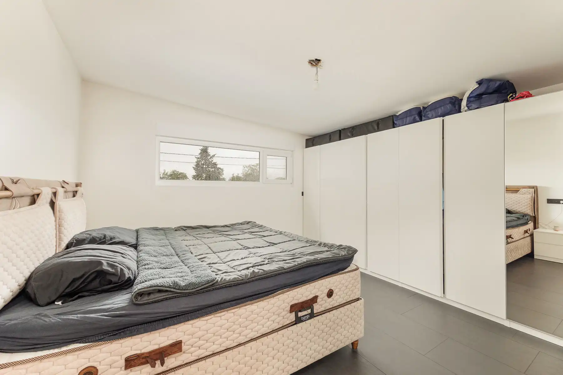 GROTENDEEL GERENOVEERDE GEZINSWONING (SPLIT-LEVEL) MET 3 SLAAPKAMERS, GROTE LEEFRUIMTE EN ZEER GUNSTIG EPC-LABEL OP EEN FIJN PERCEEL VAN 9A20CA IN GELIEFDE WOONWIJK IN HELCHTEREN foto 8