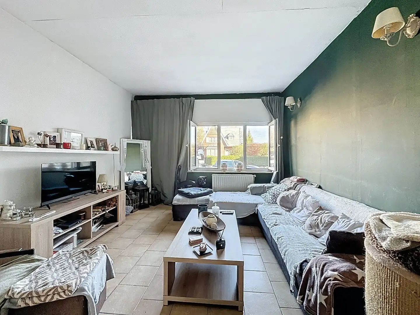 Ruime Gezinswoning met Zonnige Tuin en Renovatiepotentieel foto 2