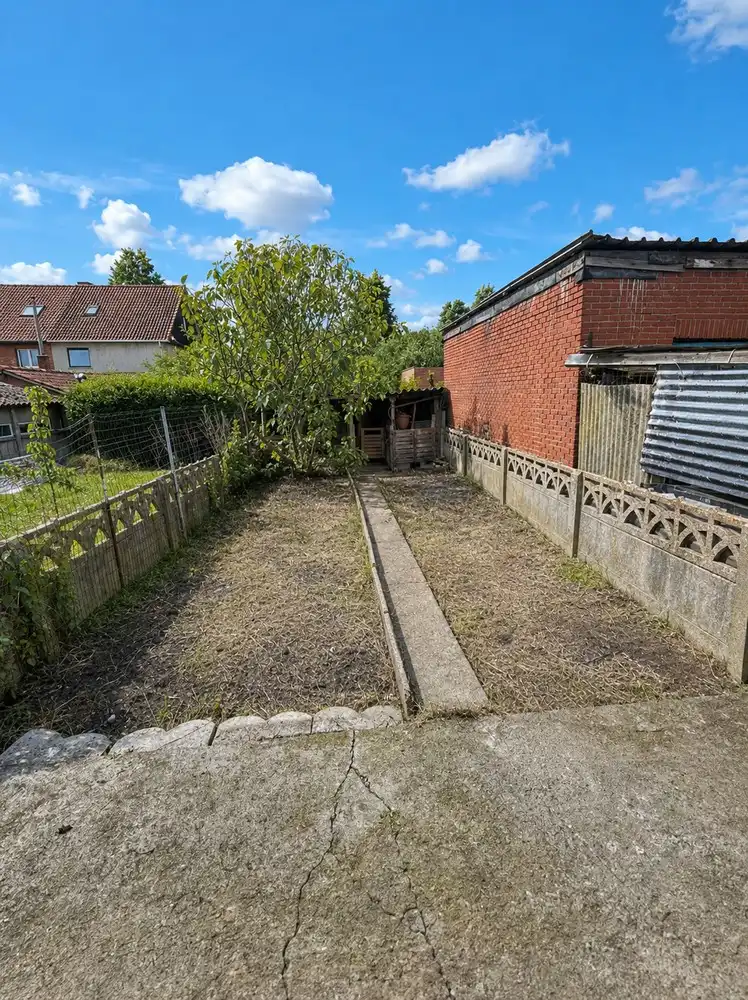 Meergezinswoning met potentieel foto 24