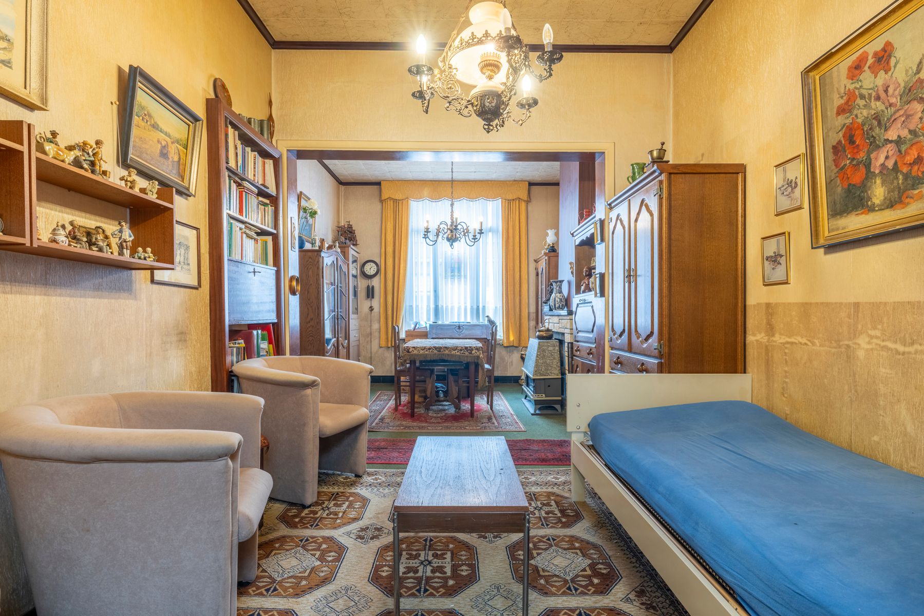 Te renoveren woning met tuin en 4 slaapkamers op toplocatie! foto 5