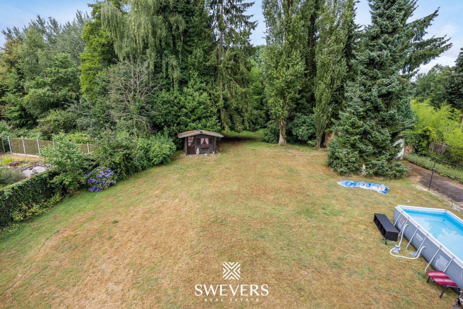 Praktische, alleenstaande woning gelegen op een perceel van 21a 08ca in Heusden-Zolder foto 32