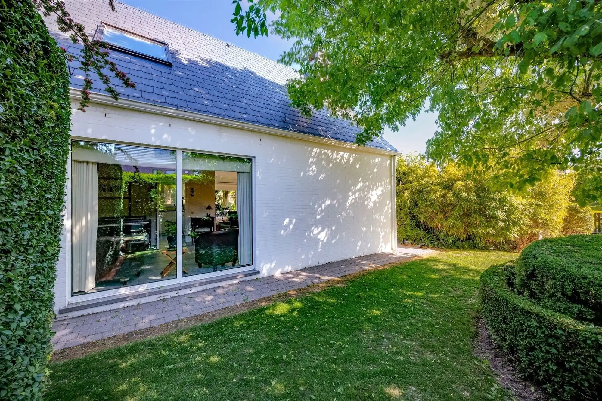 Supergelegen instapklare woning met grote tuin in Boechout foto 9