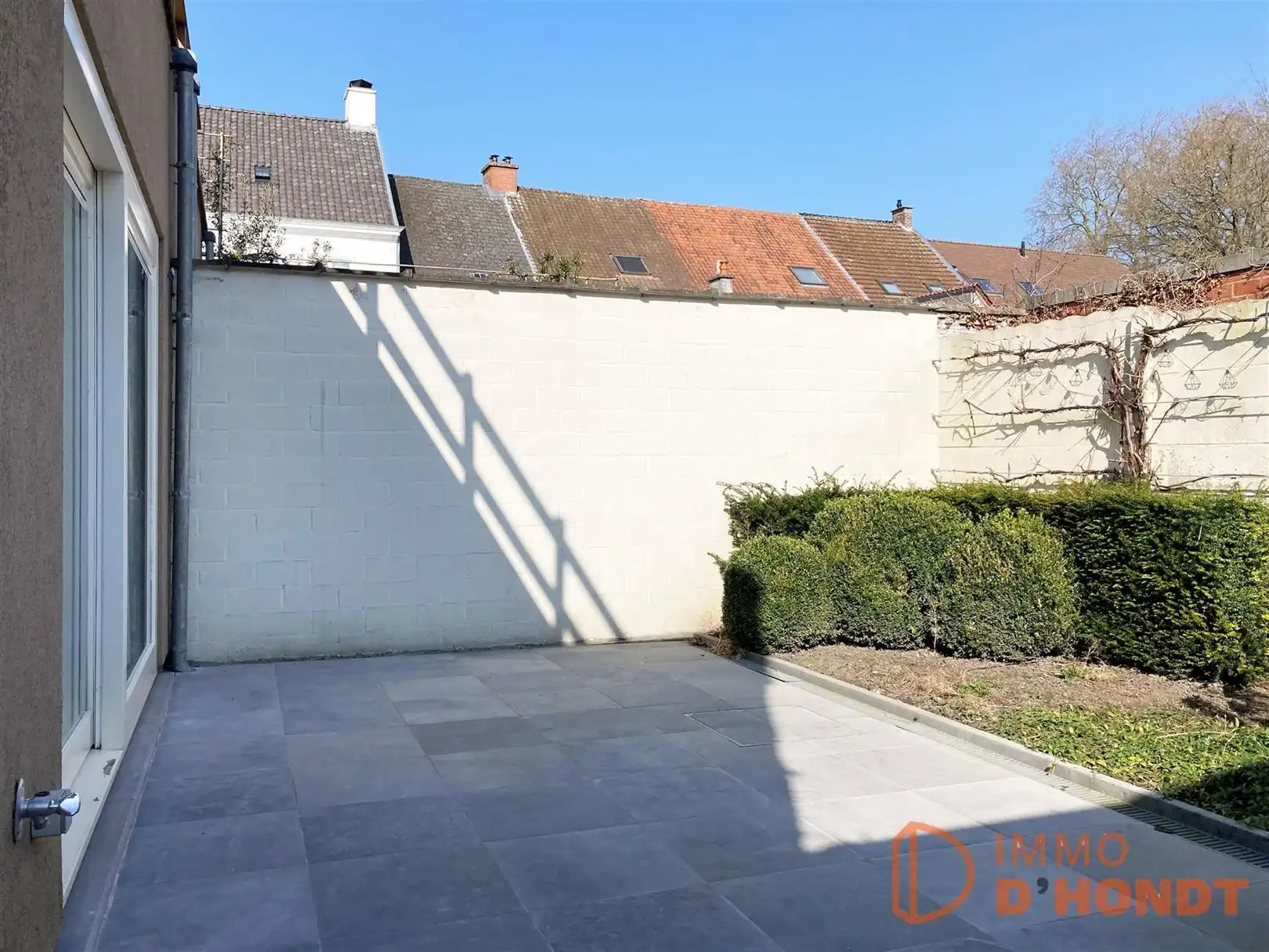 Stadswoning met tuin, terras en garage foto 9