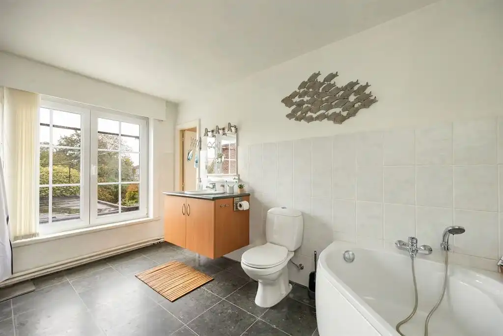 Charmante halfopen woning met grote tuin te Turnhout foto 22