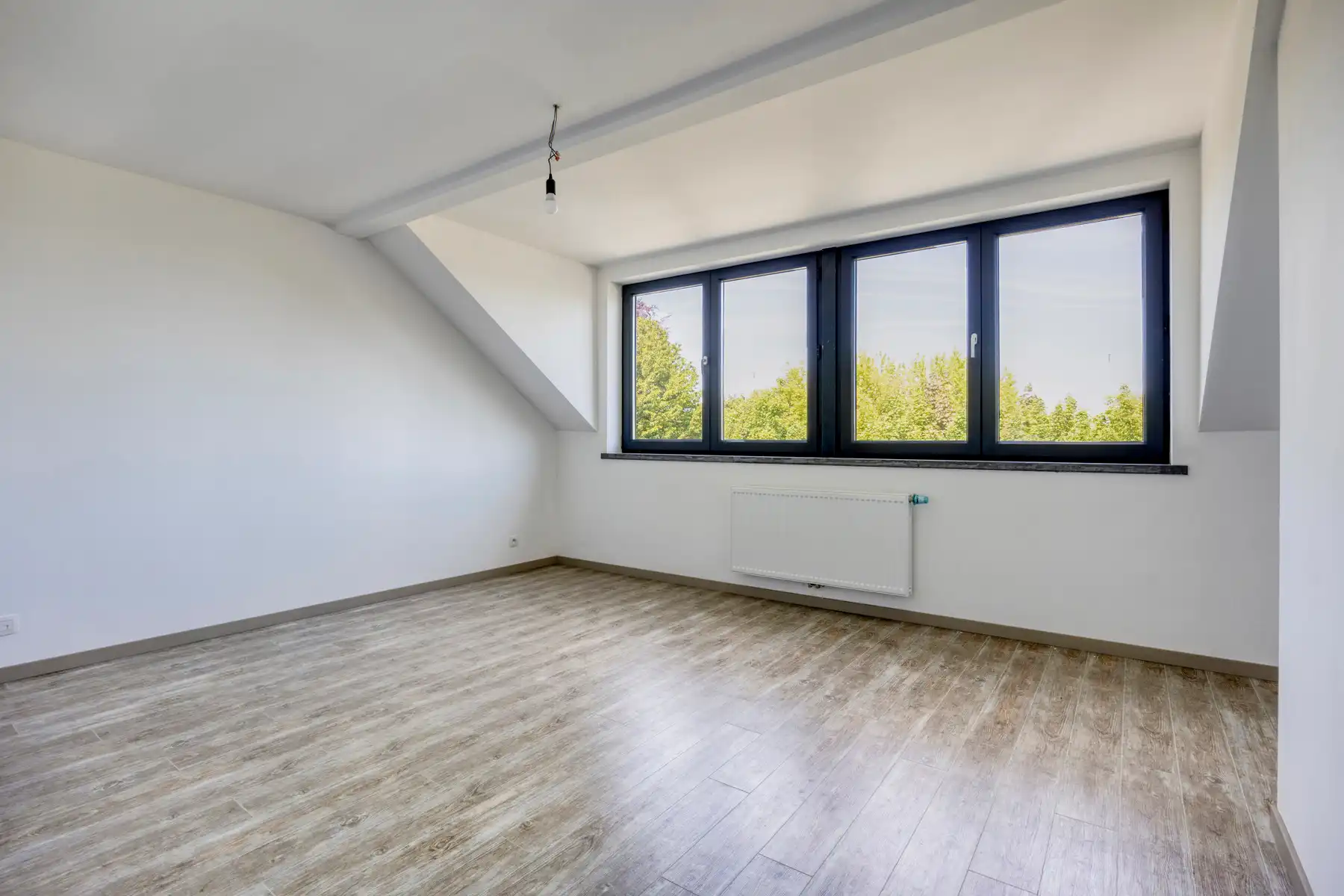 Nieuwbouw triplex met 4 slaap- en badkamers, tuin en parking foto 10