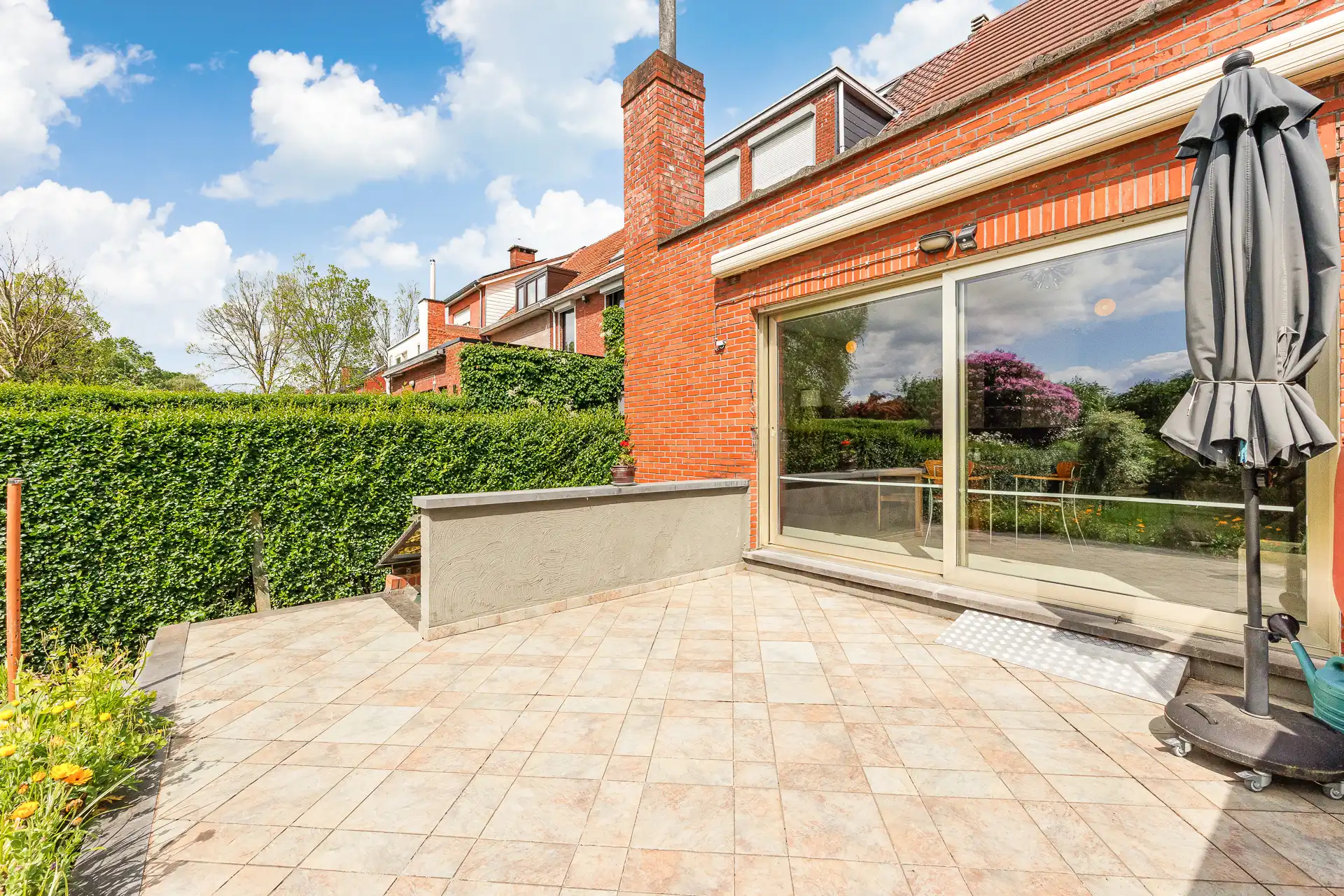 Prachtige woning met zuidgeoriënteerde tuin op toplocatie! foto 3