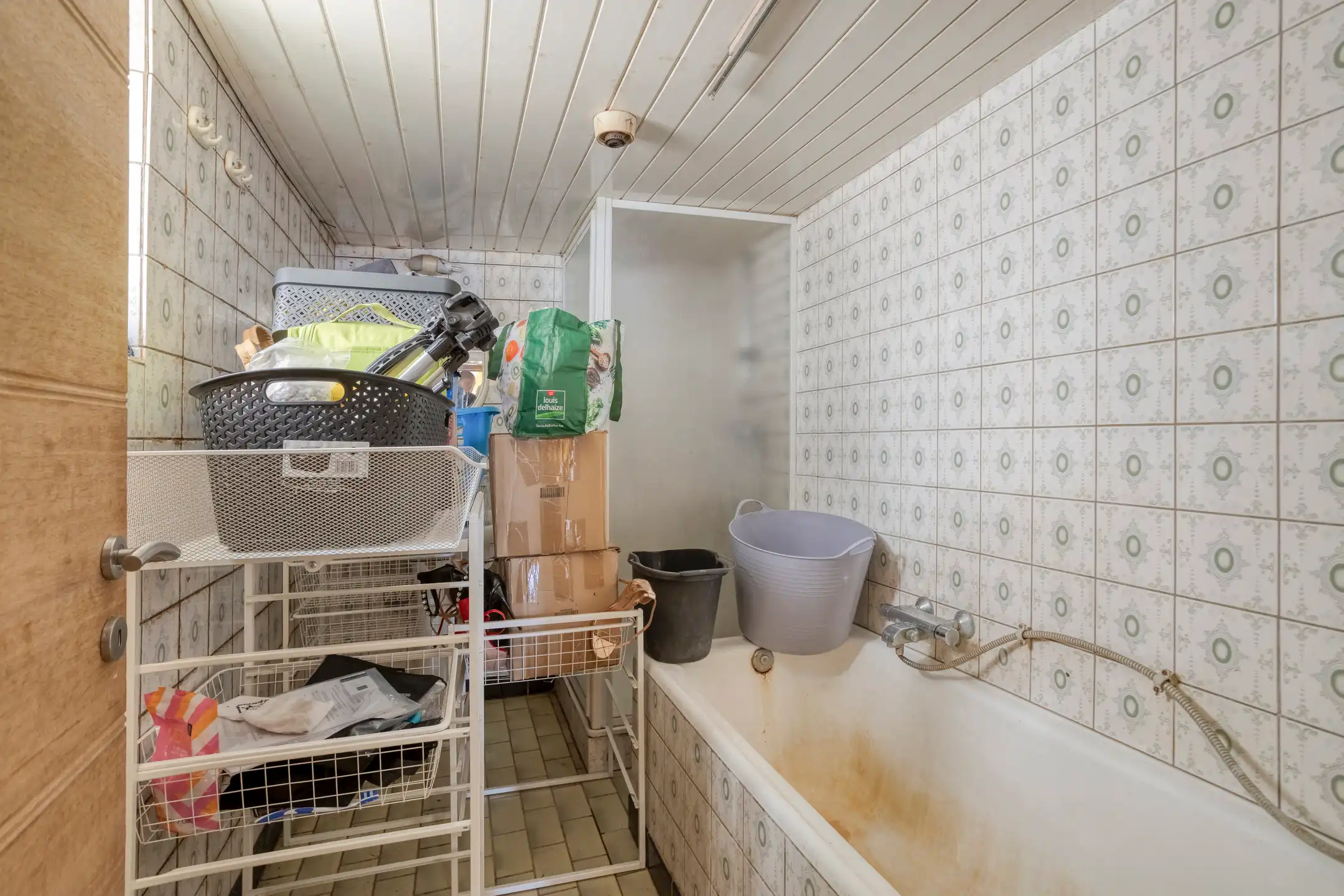 Ruime rijwoning met 4 slaapkamers en renovatiepotentieel foto 15