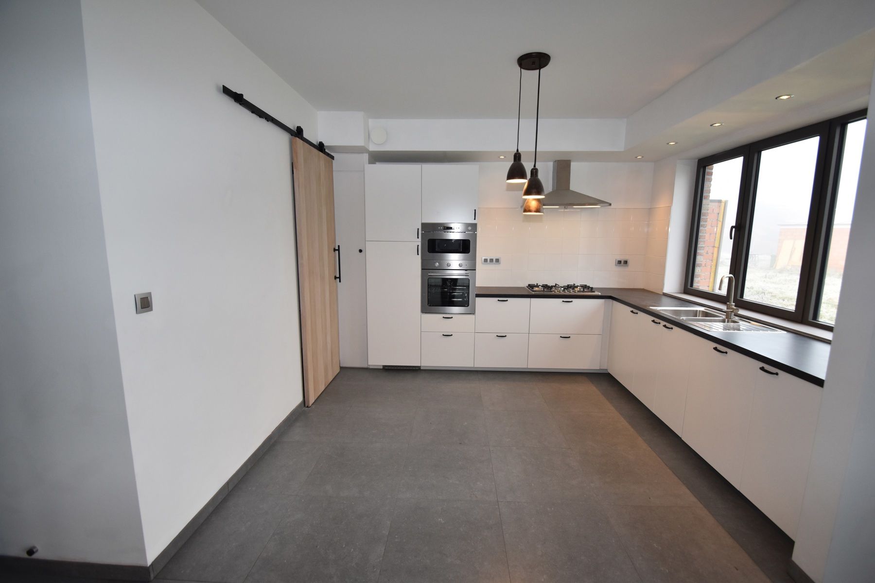 Recente, energiezuinige woning in rustige straat in Holsbeek foto 4