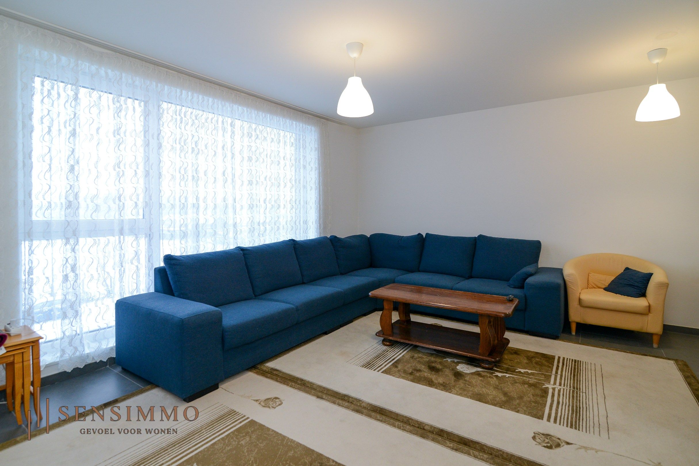 Tweeslaapkamer appartement met dubbel terras, parking en kelderberging foto 8