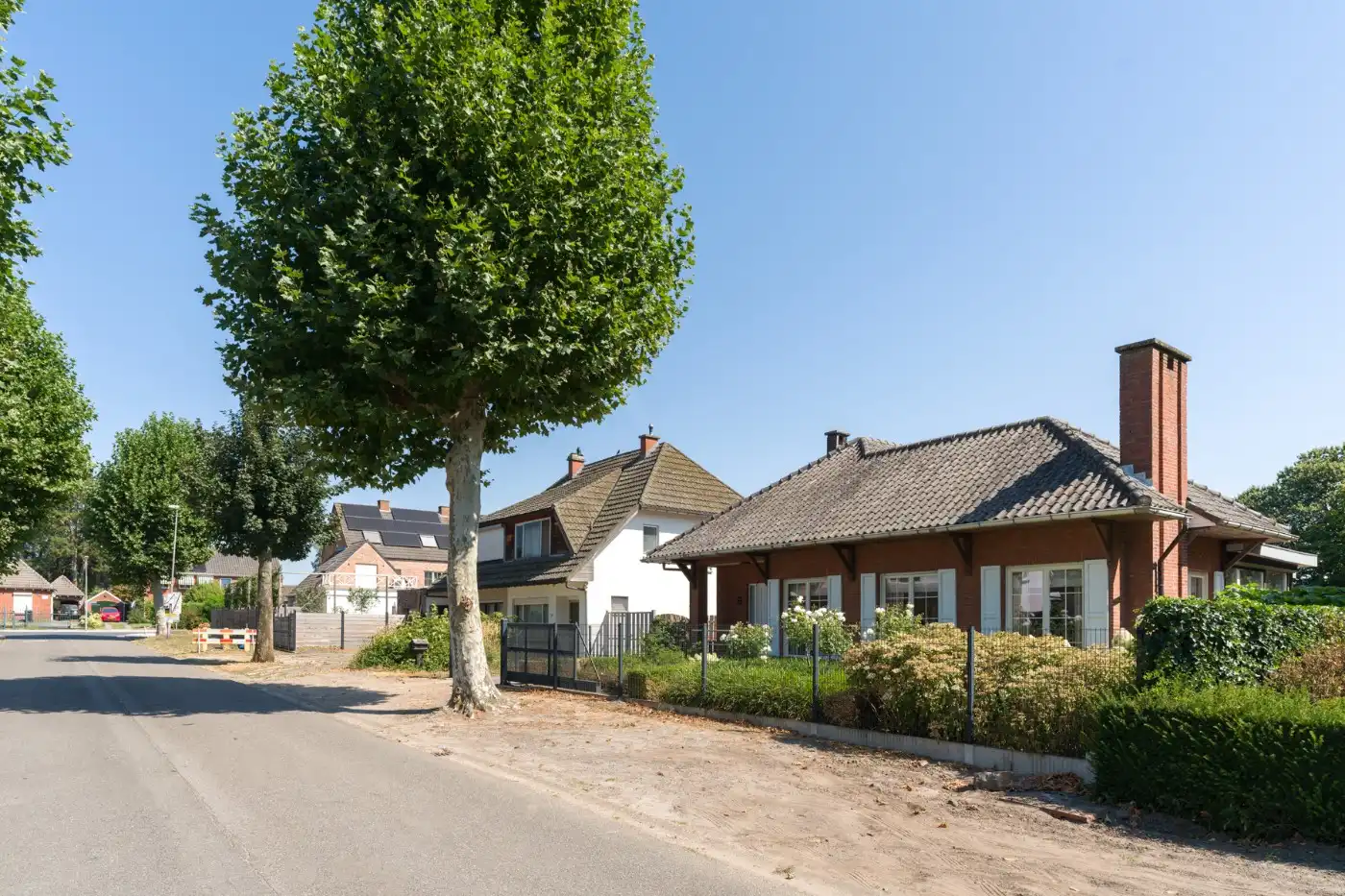 Vrijstaande laagbouwwoning met 3 slpk., garage en prachtige tuin foto 32