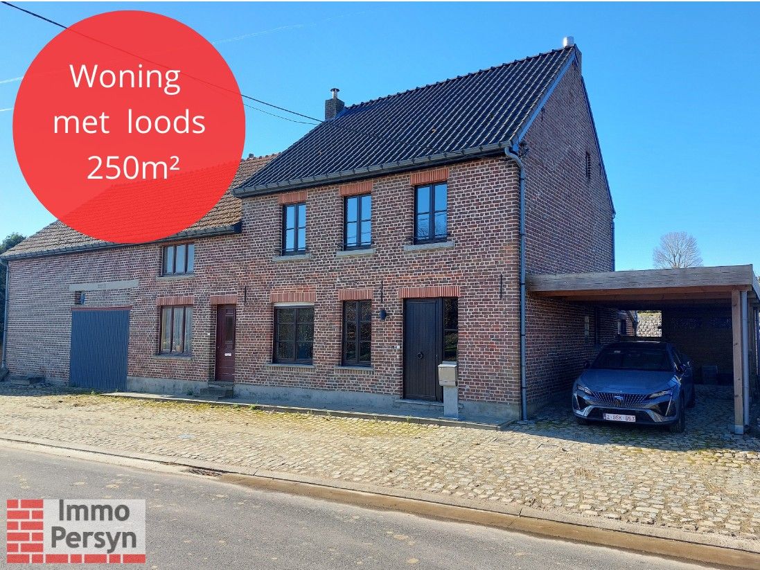 Rustig gelegen woning met loods foto {{pictureIndex}}