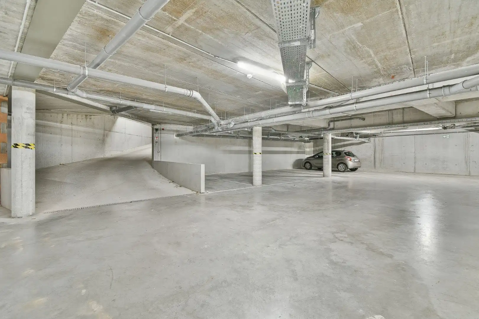 Ondergrondse parkeerplaatsen te koop in het centrum van Gistel foto 2