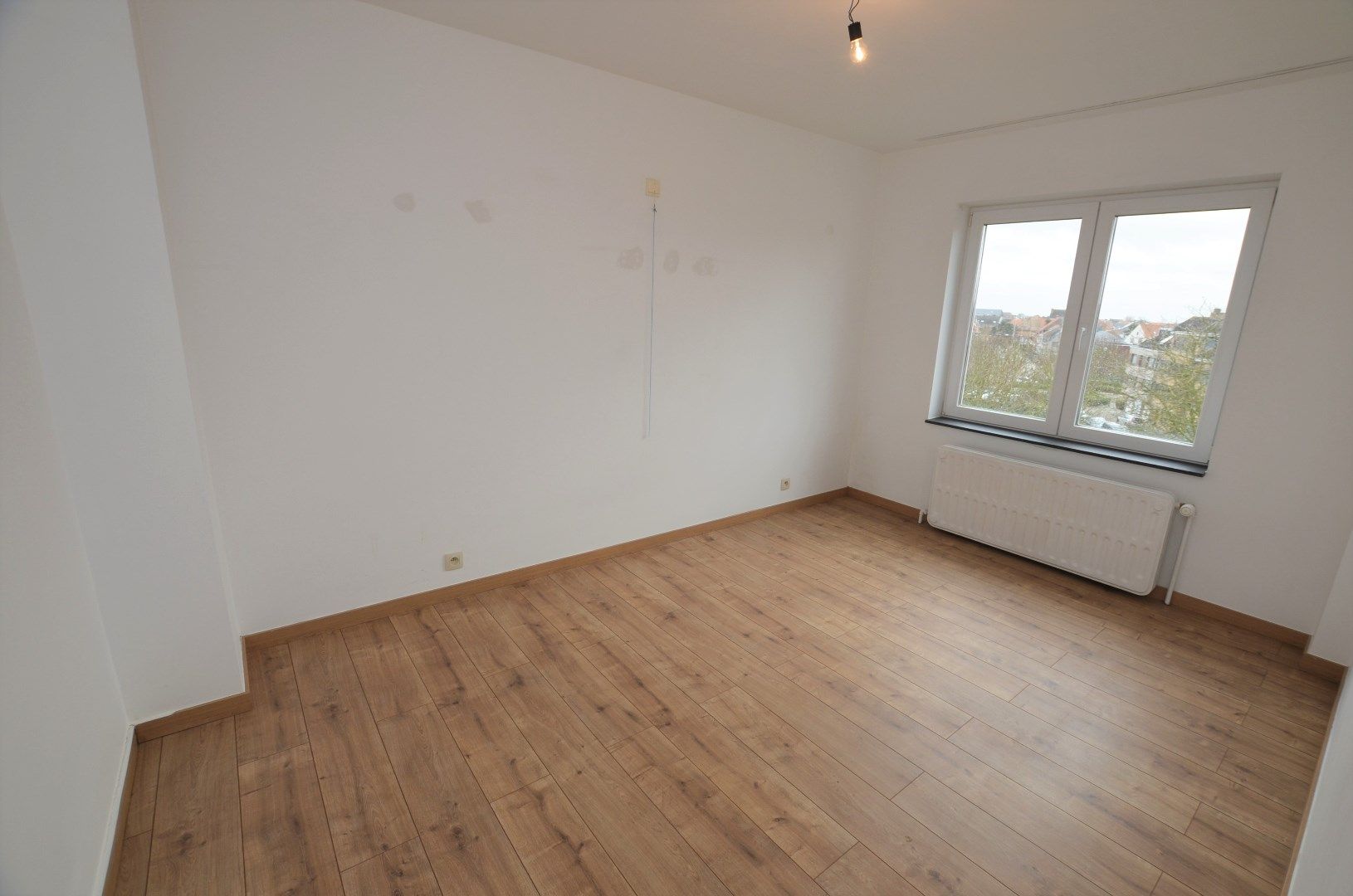 Lichtrijk volledig gerenoveerd hoekappartement  foto 4