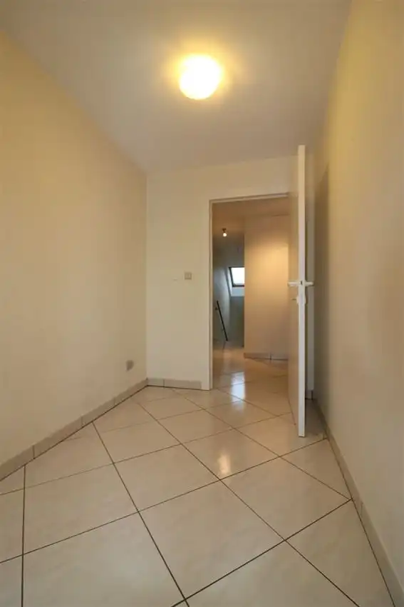 Duplex met 3 slpk., ruim terras en garage nabij station foto 22