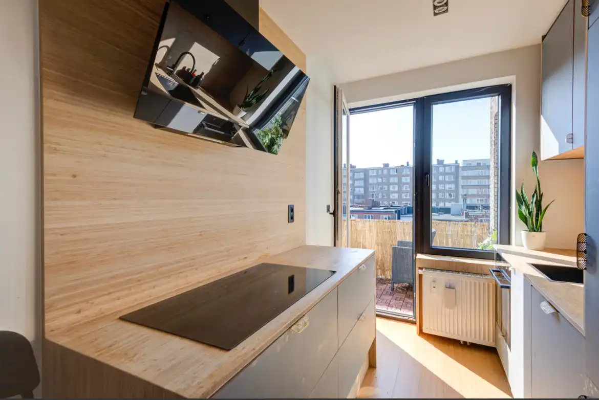 VERLAAGDE PRIJS! | Schitterend penthouse met overvloedige lichtinval en prachtig parkzicht! foto 13