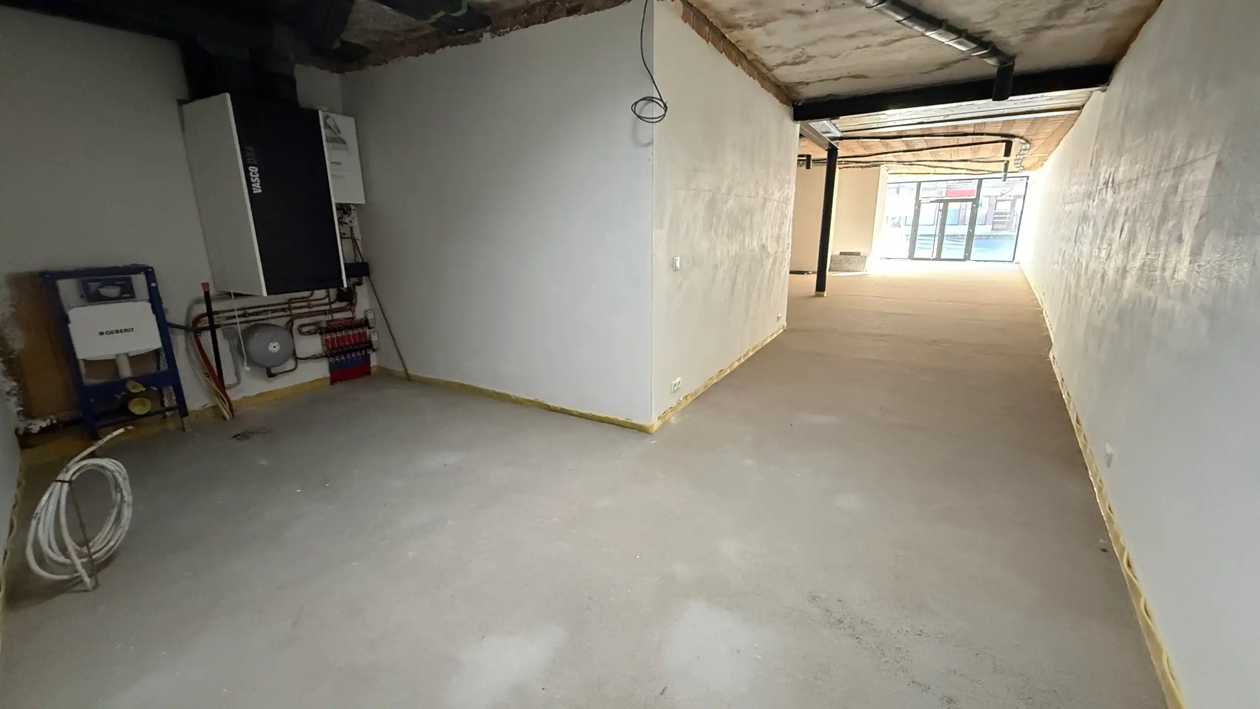 Handelspand met twee appartementen foto 3