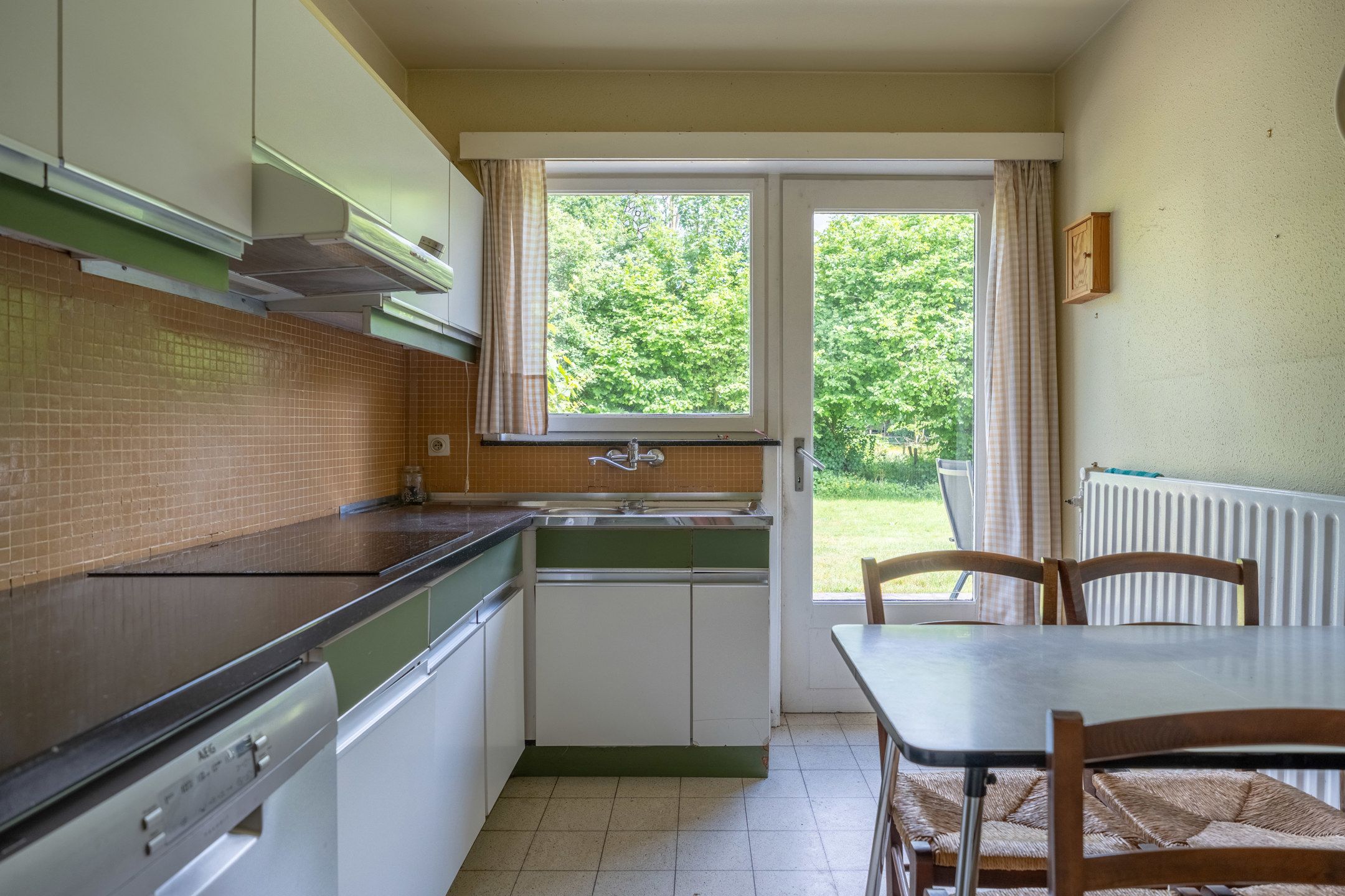 Te renoveren gelijkvloerswoning op mooi perceel van 1.437 m² foto 13