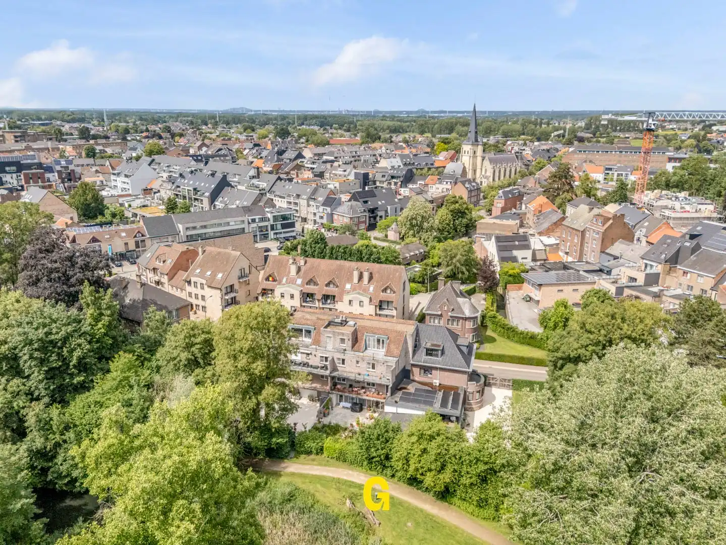 Uitstekend verzorgd 2-slaapkamer appartement in hartje Bilzen, met standplaats, kelderberging en terras met zicht op het Park van Haffmans foto 30