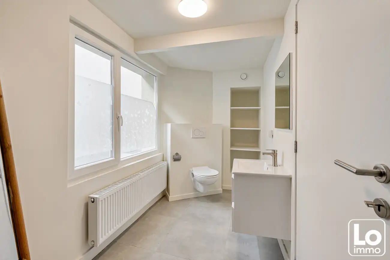 Recent gerenoveerde woning met 2 slaapkamers en zuidoost gerichte tuin in Heusden foto 7