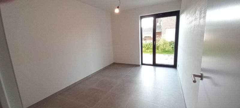 Dit appartement is gelegen langsheen de Langerbrugsestraat te Evergem. foto 9