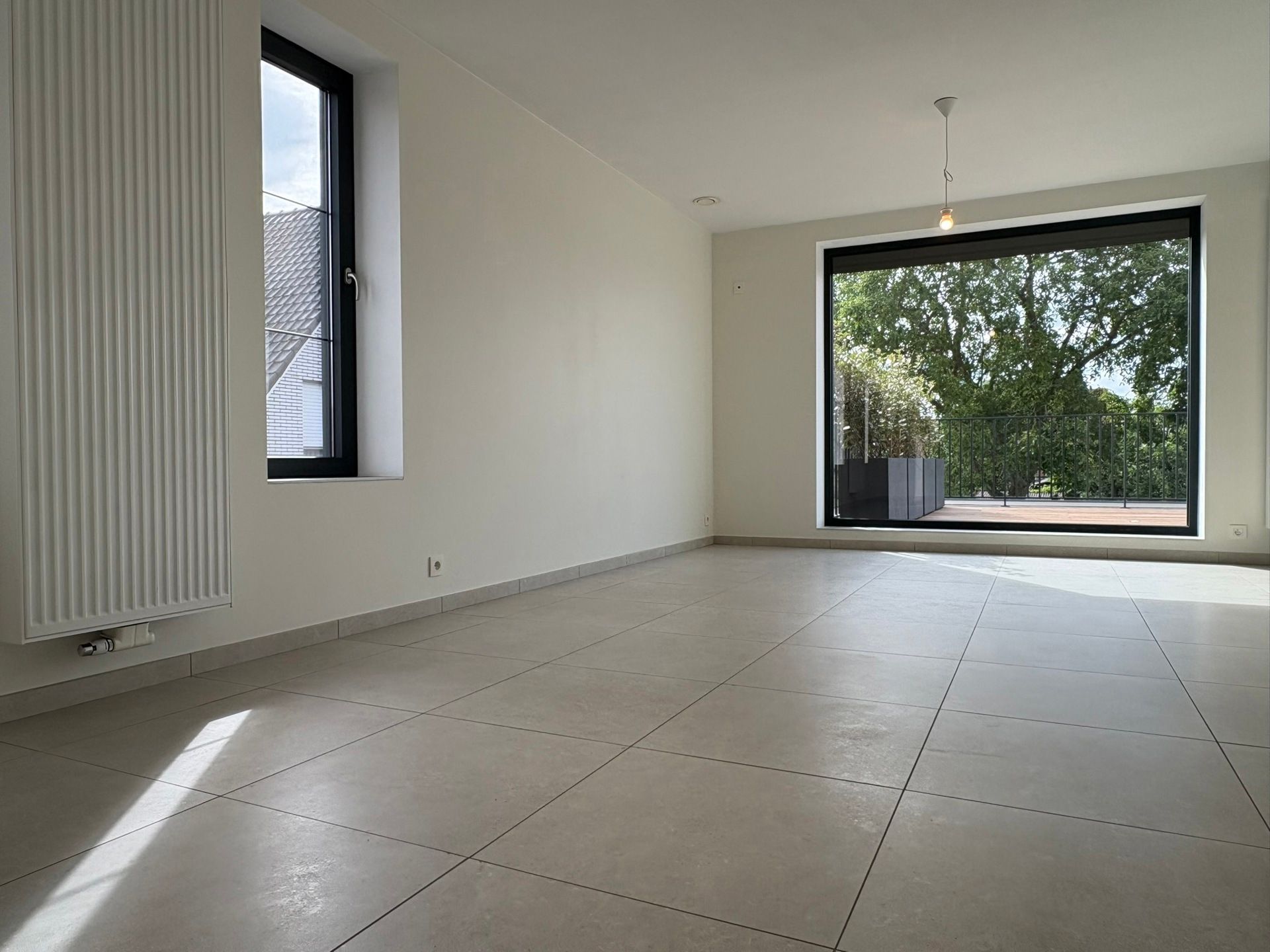 Instapklaar appartement met zonneterras, autostaanplaats en veel lichtinval foto 7