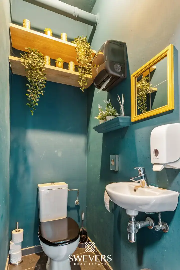 Investeringspand met huurder handelsruimte in hartje Tessenderlo, 97m², plus terras, tuinzone en parkeerplaats.   foto 16