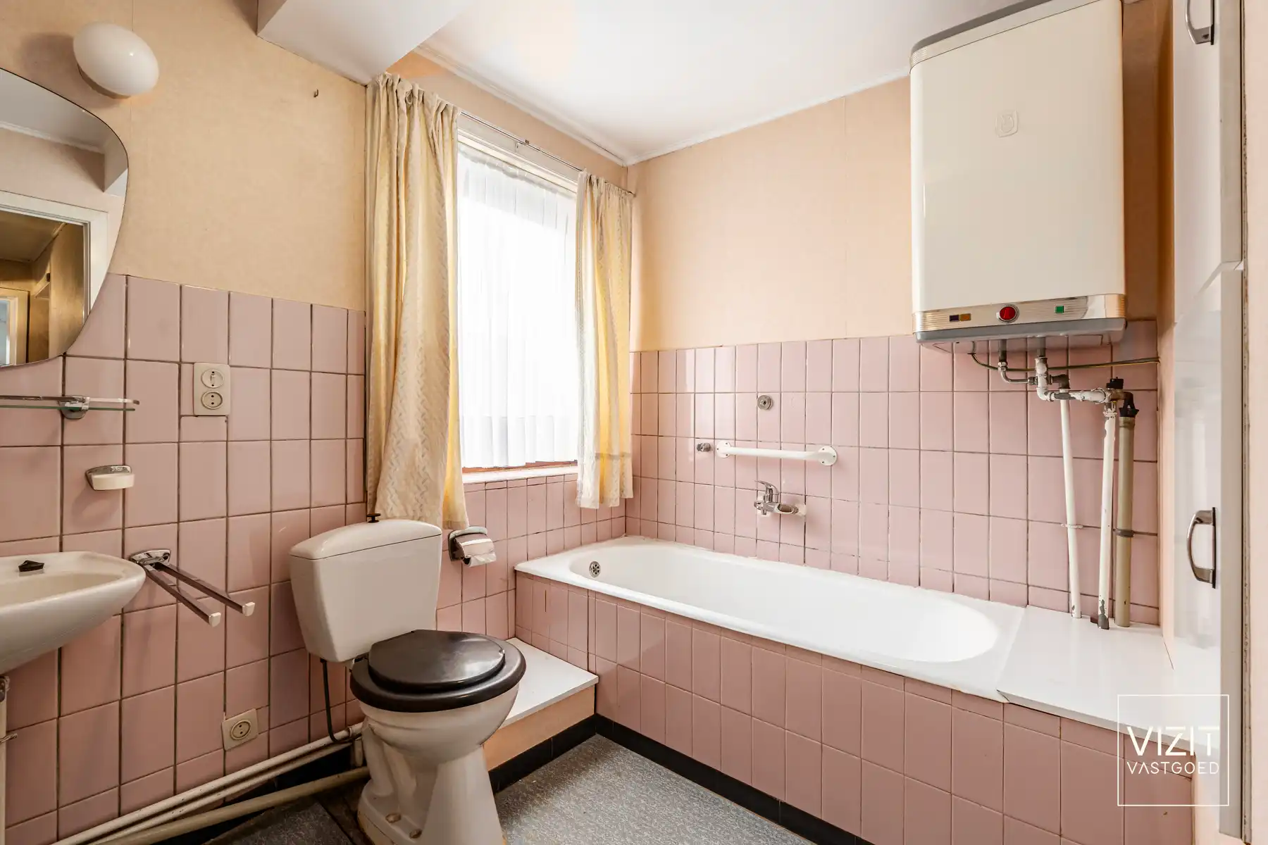 Halfopen woning met tuin en garage foto 23